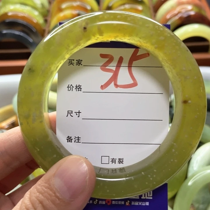 伟***吖未镶嵌蛇纹石玉手镯