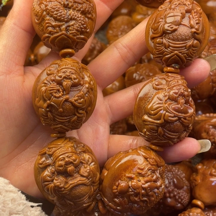 橄榄核吊坠开***乐橄榄核