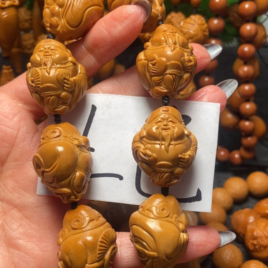 橄榄核吊坠八方来财微花