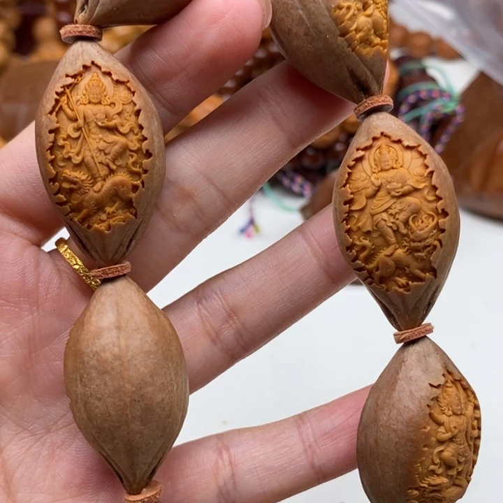 橄榄核吊坠原皮佛