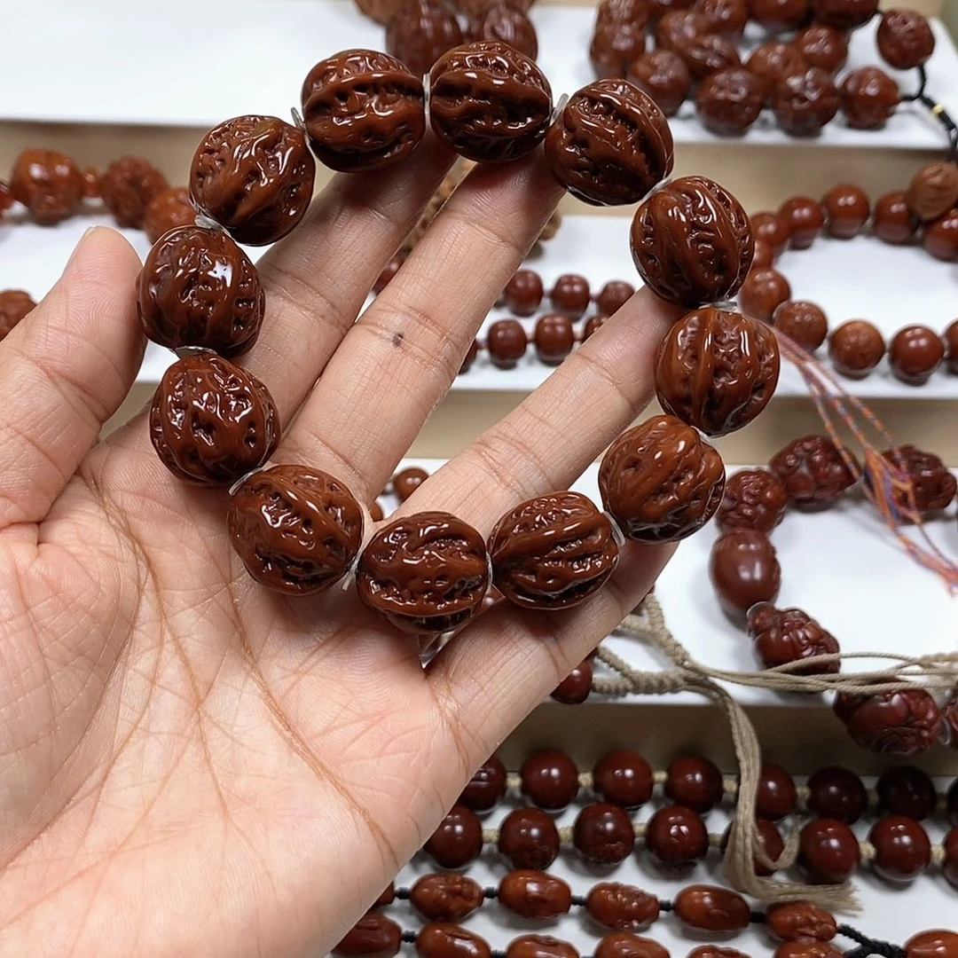 橄榄核吊坠老****j核桃核桃