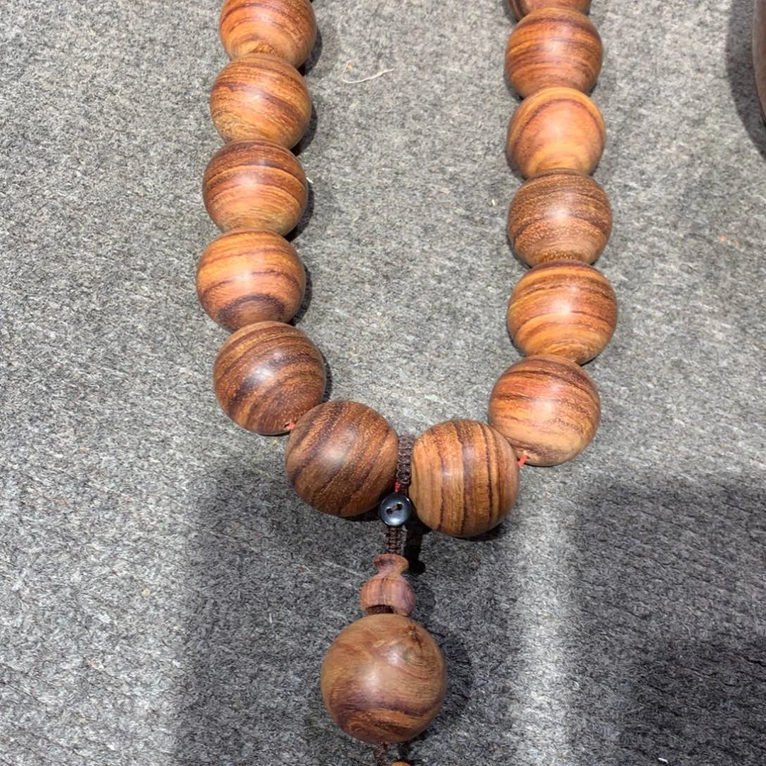 弦***音木越南黄花梨手持3.0