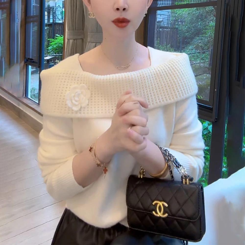 秋季白色镂空针织衫女慵懒高级感减龄洋气内搭打底毛衣一字肩上衣