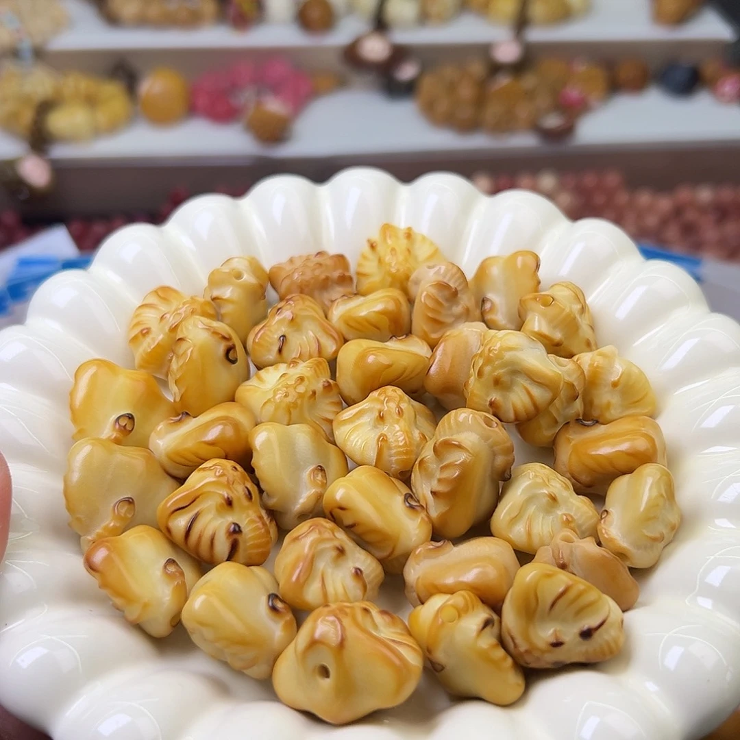 菩提根/象牙果吊坠2颗炭烧象神