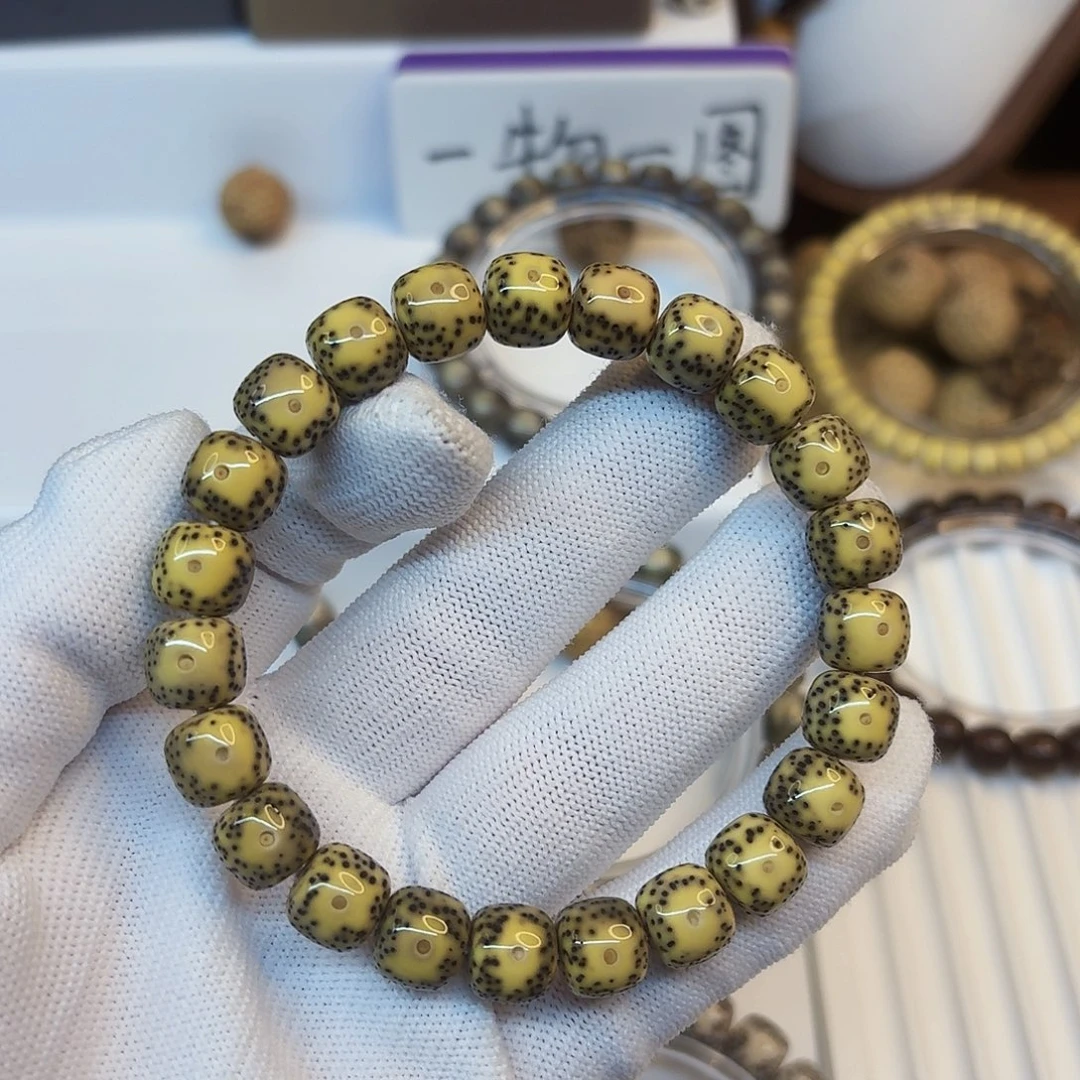 蔡***_星月菩提手串卡10黄金瞳大眼睛15