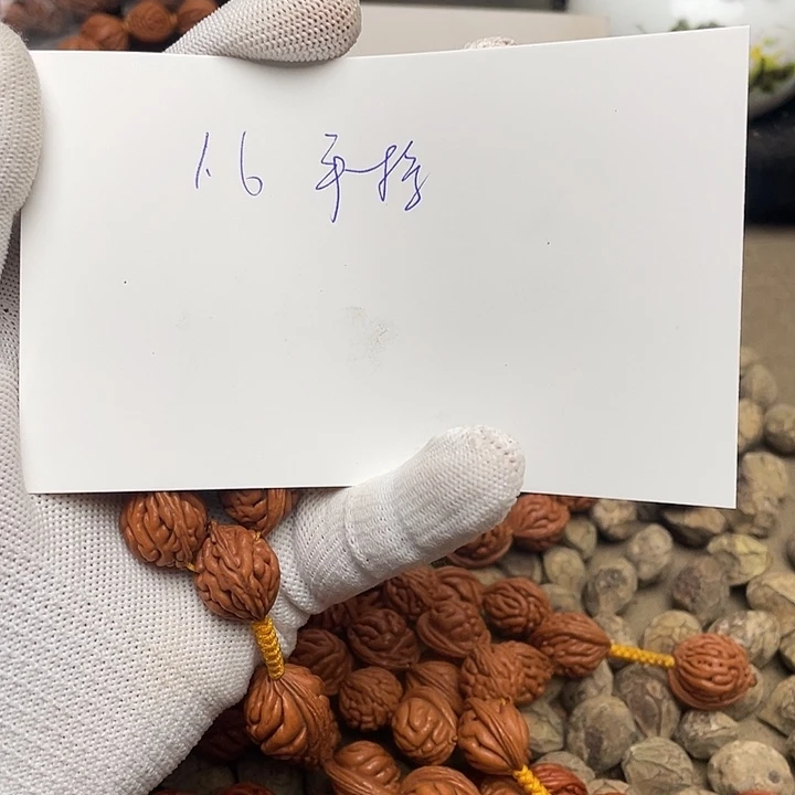 朱***琴桃核吊坠龙纹桃核的搭配