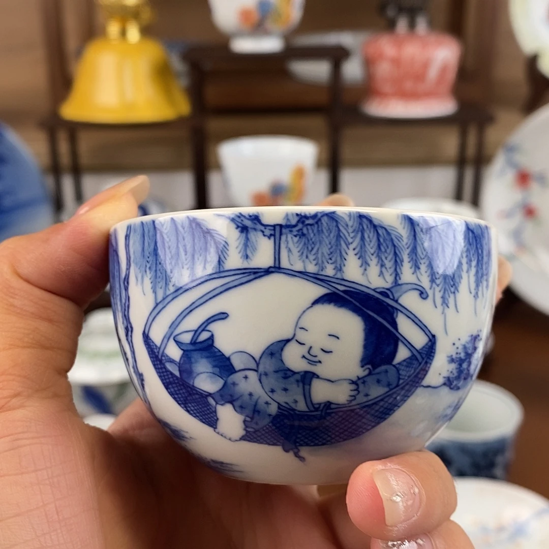泥艺瓷梦童子打弹弓卧足杯