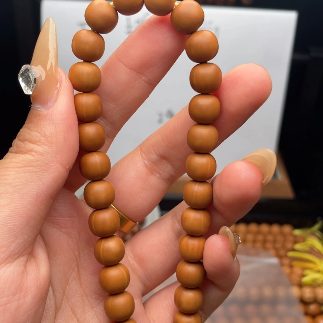 归***一手串桃核微瑕老型