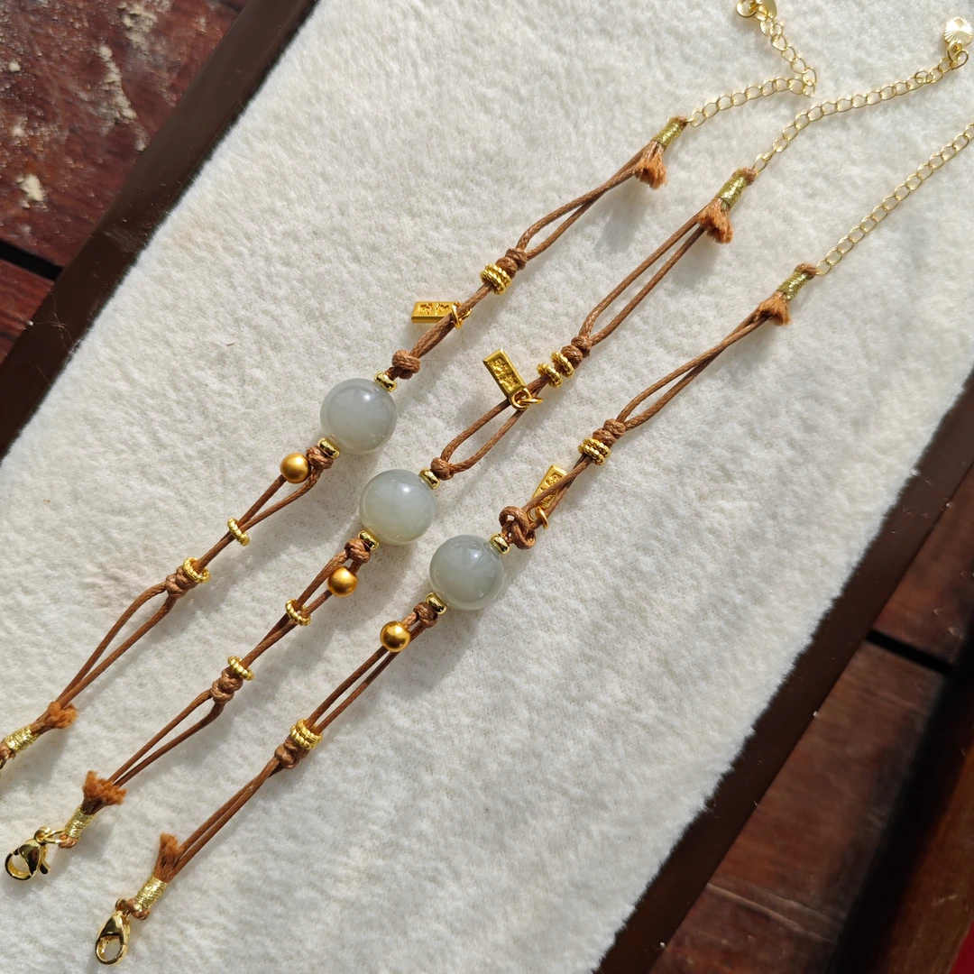 122913手工编织女款手链主珠和田玉烟子料