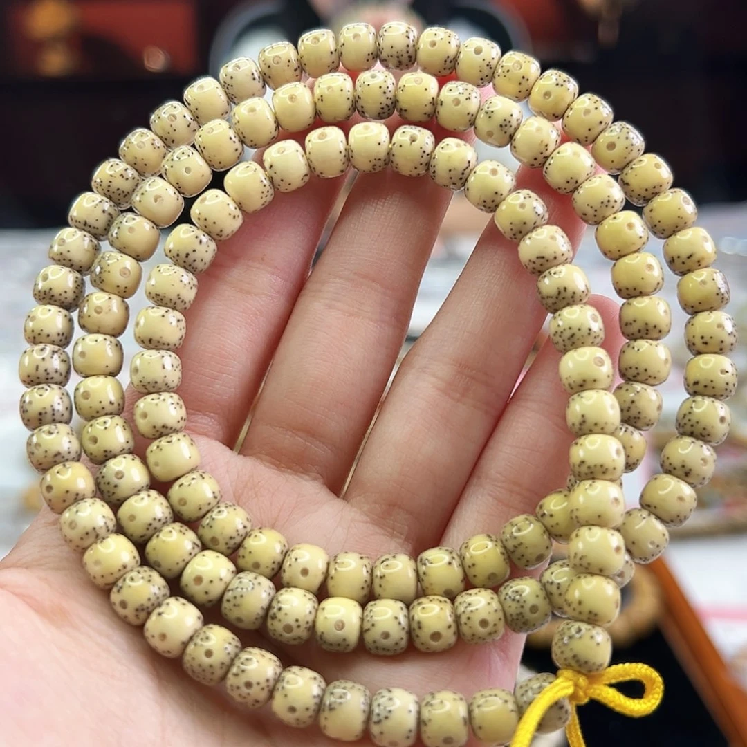 手串星月菩提Fqh7*6柠檬黄 通体留白 针尖星