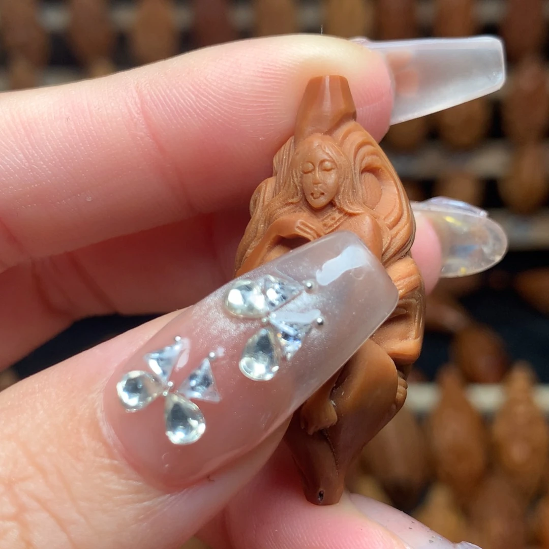 把件橄榄核九尾狐