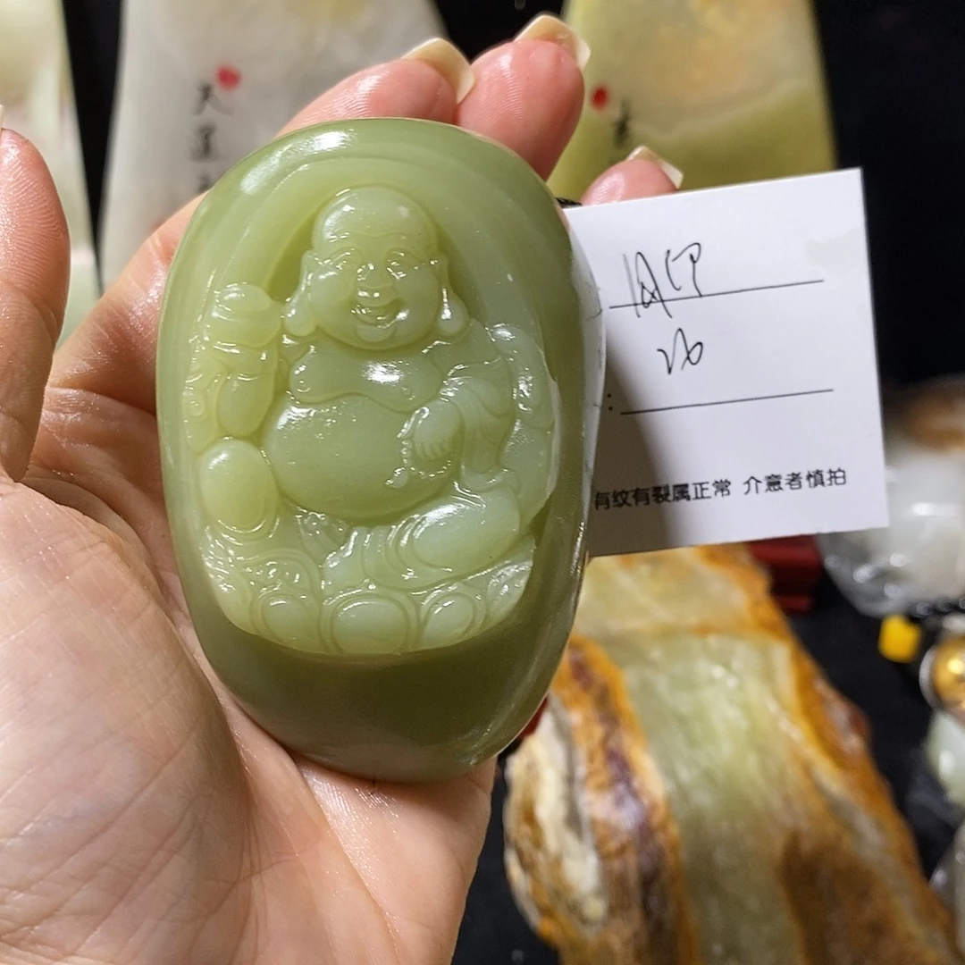 石材月**人古青石手把件