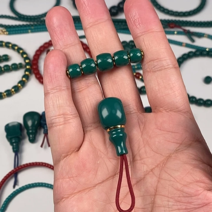 我****玻璃毛衣链油绿一套891098，三通