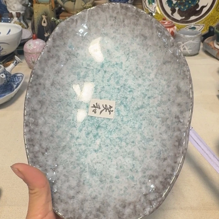 陶盘子上有个大包子的