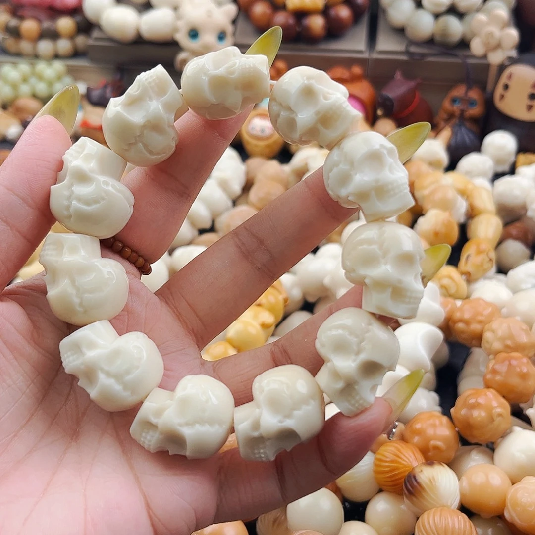 吊坠菩提根/象牙果微微瑕骷髅头