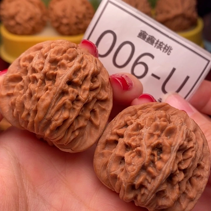 桃核把件汗高楼42……