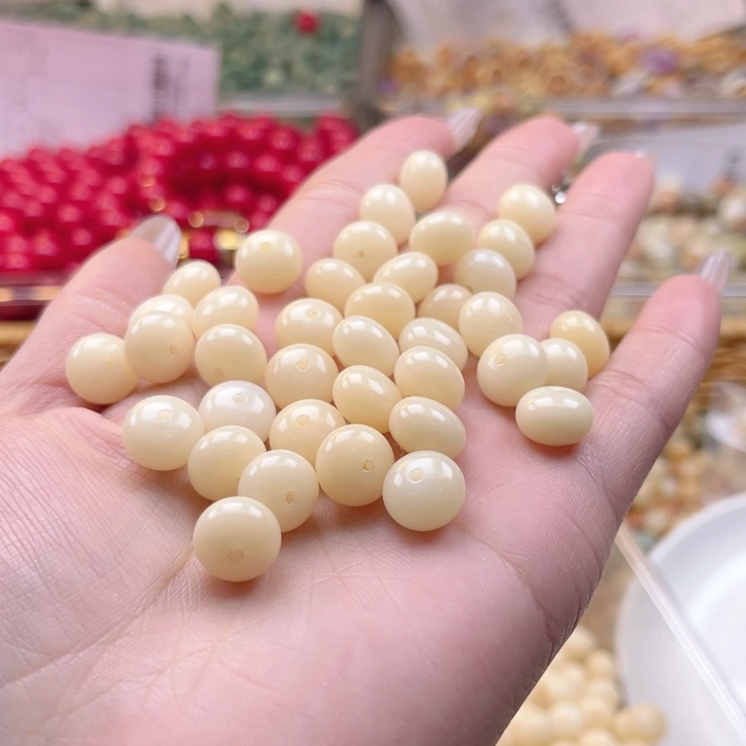 白玉菩提吊坠z10.75mm120颗。算盘