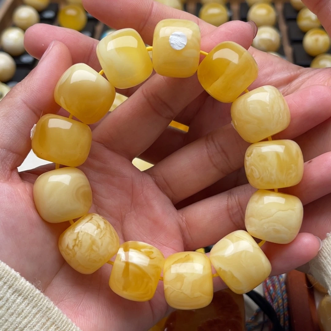 蔡***锅琥珀未镶嵌裸石蜜蜡手串微瑕笑