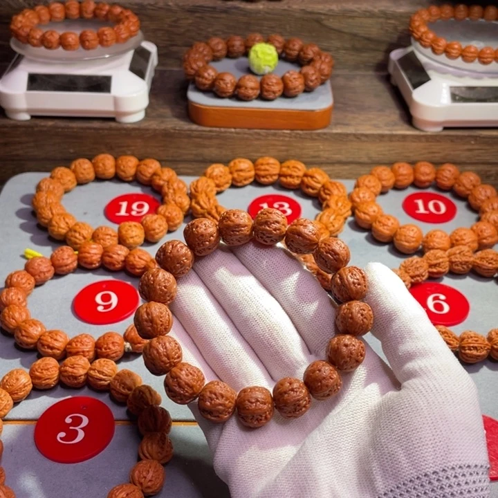 袁****文玩核桃手串金元宝