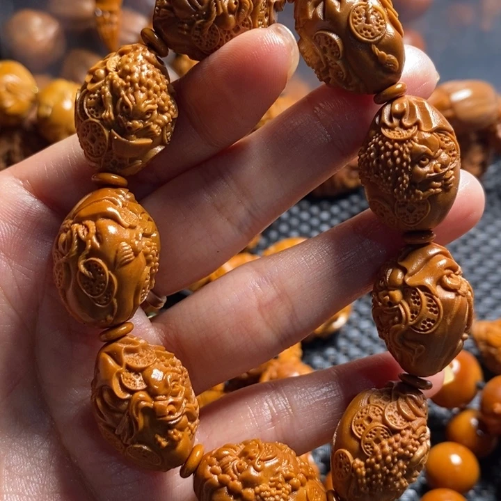 橄榄核吊坠金蟾手串