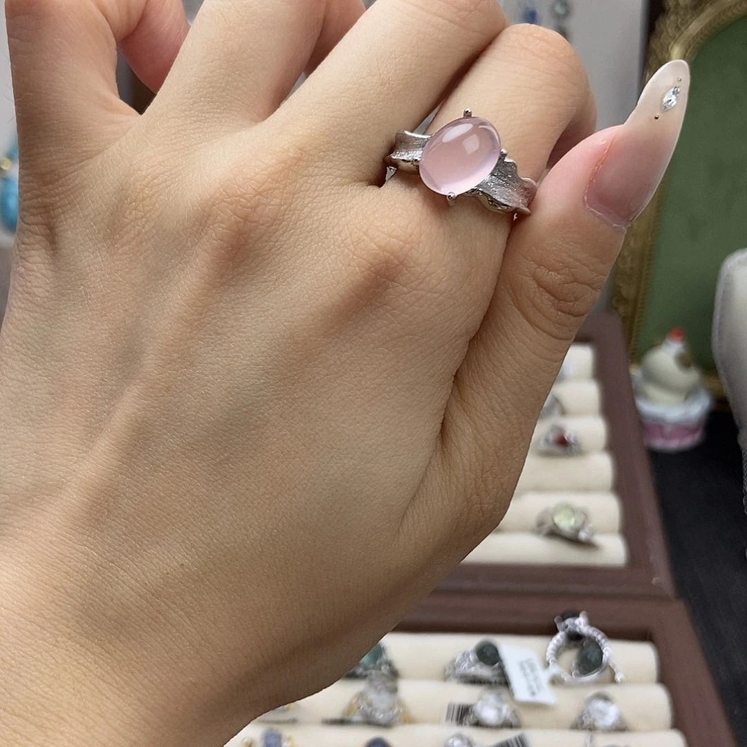 蝴****水晶戒指银S925镶嵌粉水简单