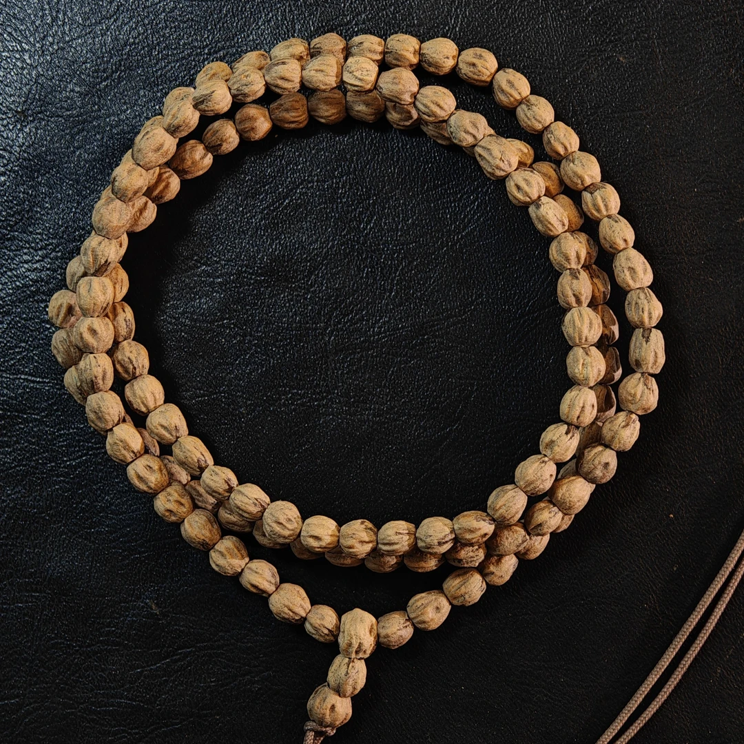 “质子”系列 热振百香籽，顺纹红牙，120籽，油皮