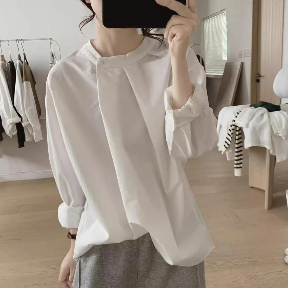 早秋季新款不规则衬衫女宽松大码显瘦小众设计感褶皱纯棉套头上衣
