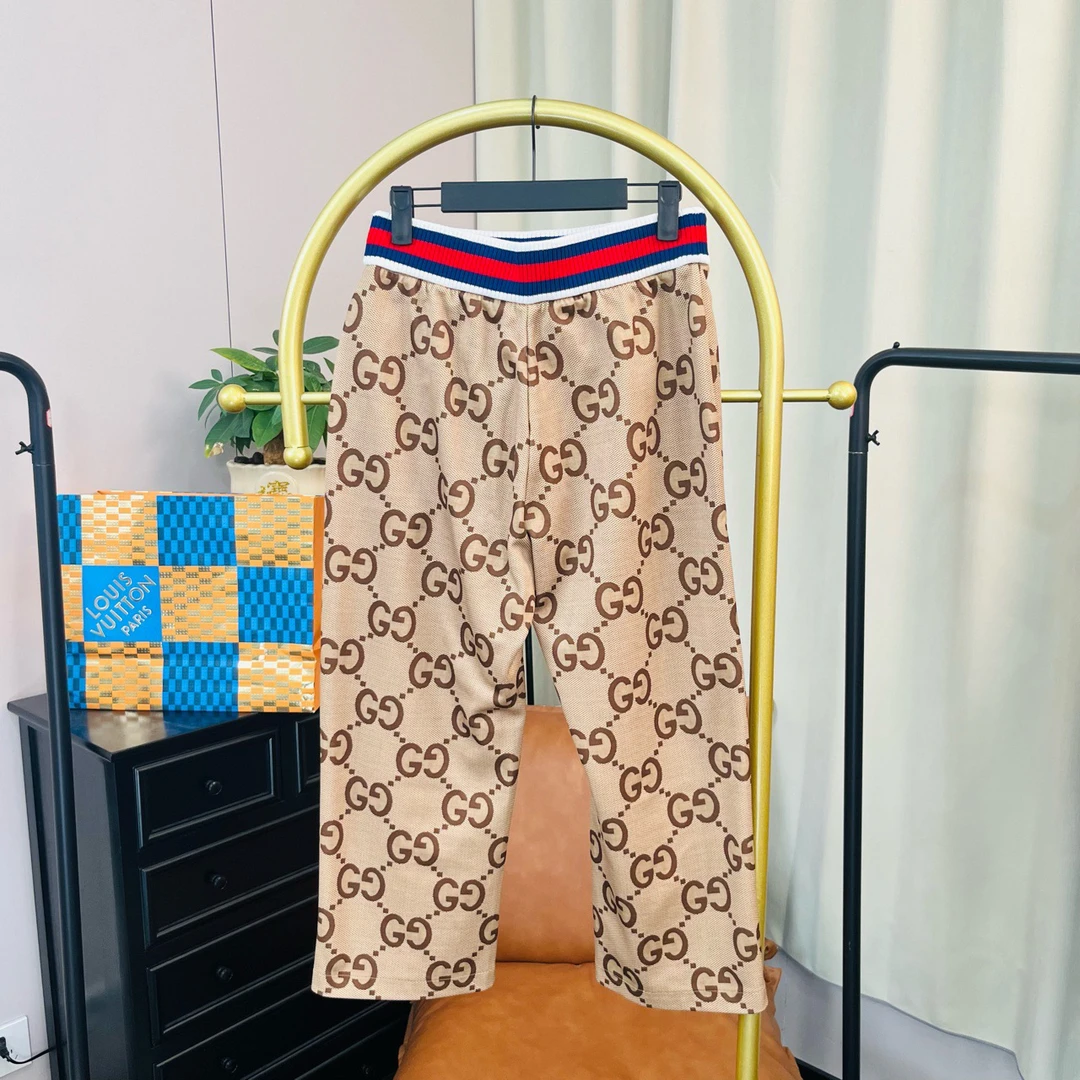 99新 GUCCI/古驰 棕色满印长裤 XS码