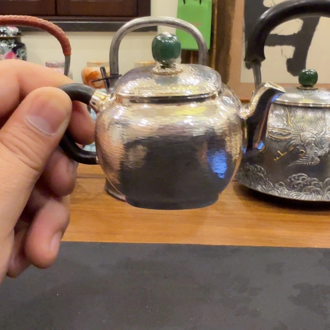 呆坐四方银韵银壶