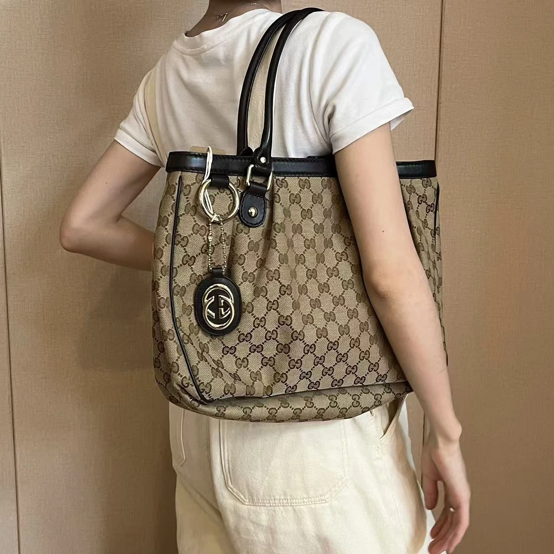 95新 GUCCI/古驰 满印双G拼棕褶皱手提包/H21504