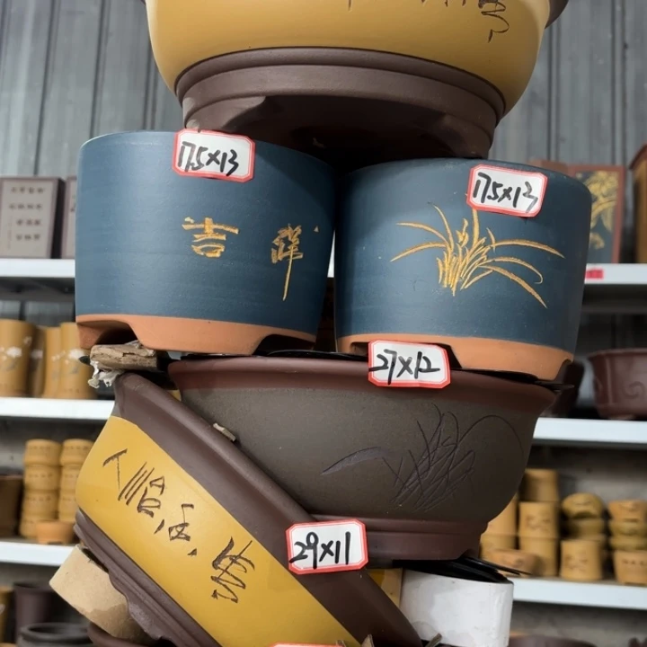 紫砂花盆100-6。