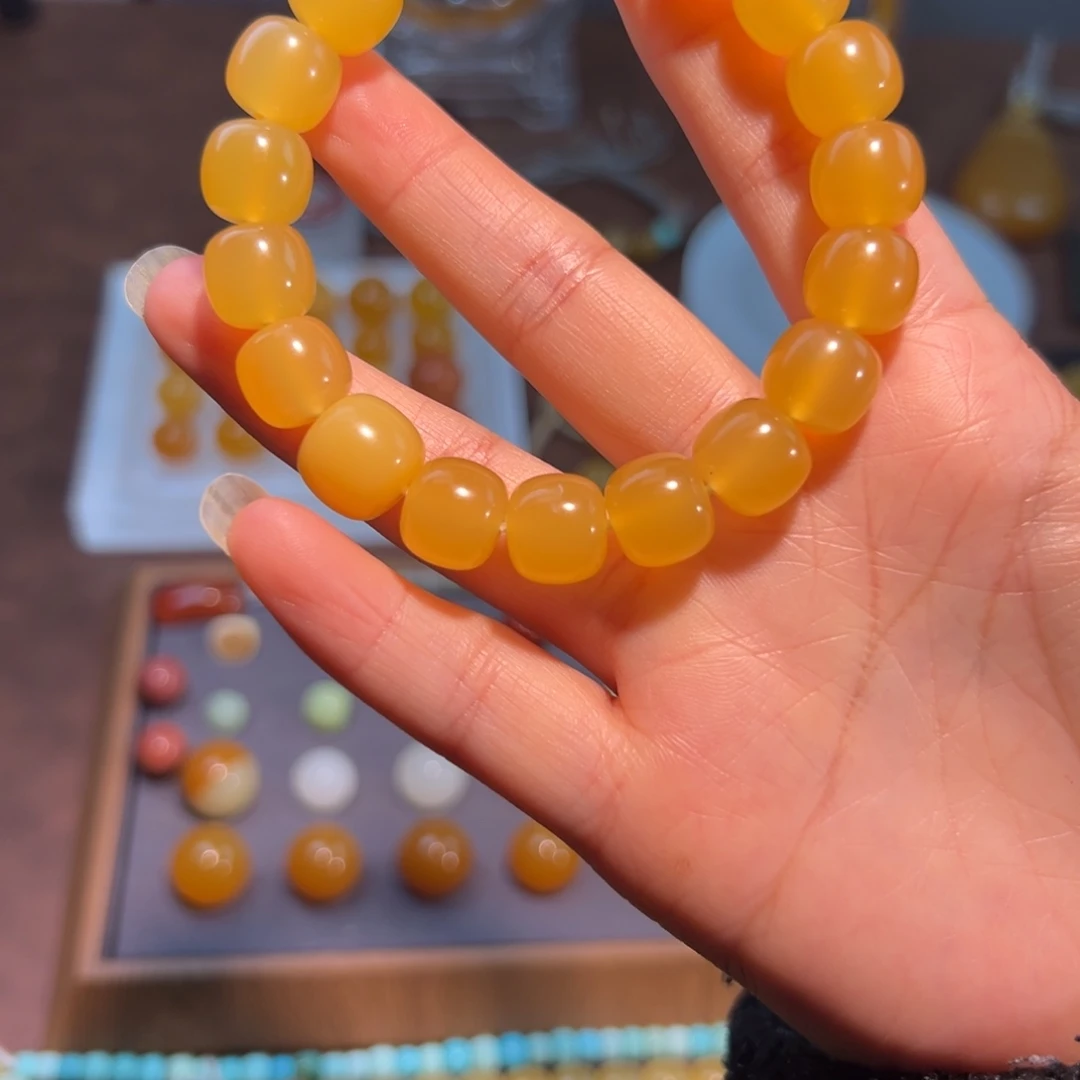 慧***姐石英质玉（缅黄）未镶嵌缅黄老型珠