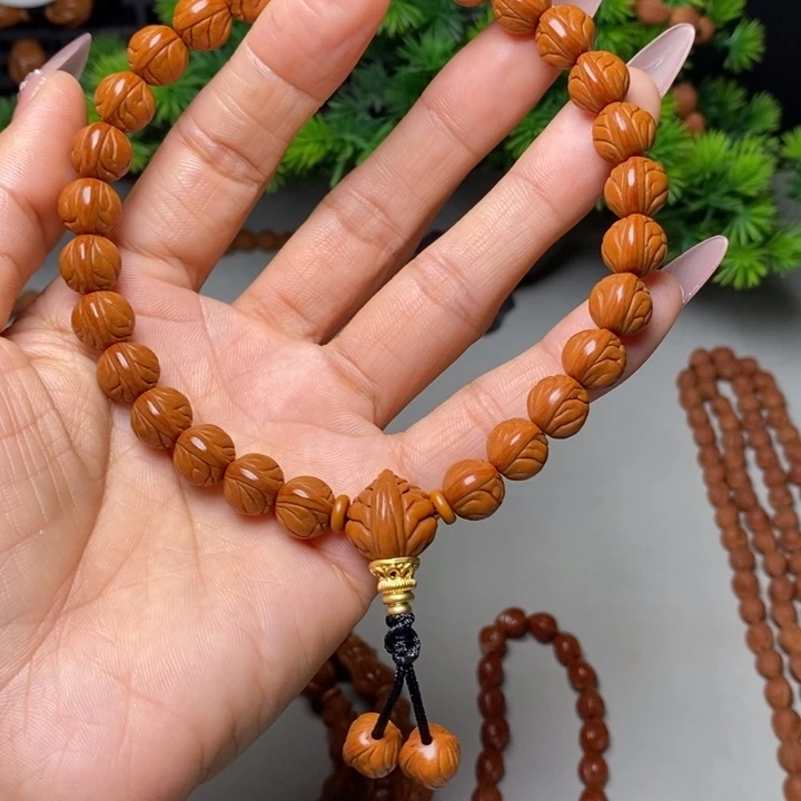 煊***煊桃核手串玉龙脊手持