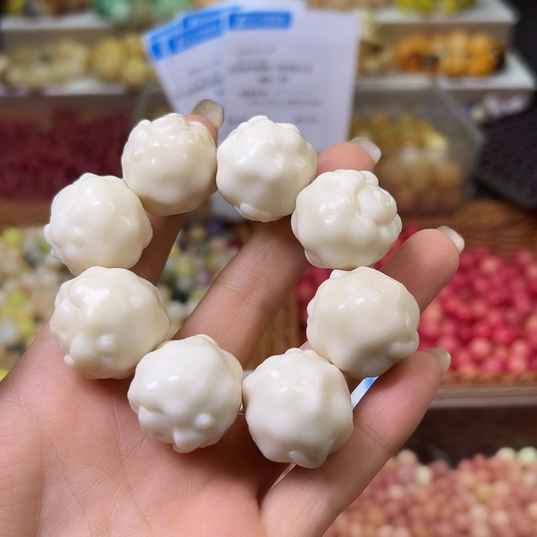 菩提根/象牙果手串瑕疵白羊头1条卡24左右有裂