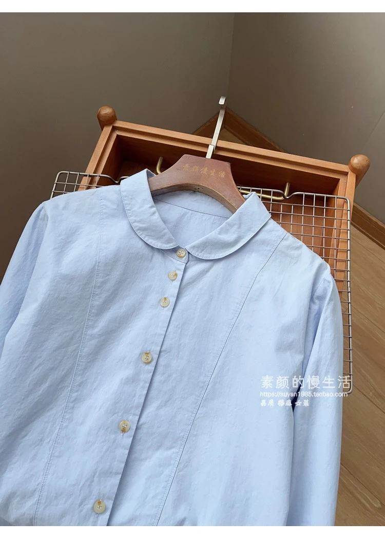 文艺复古通勤风棉麻婴儿蓝衬衫女百搭宽松百搭娃娃领长袖排扣上衣