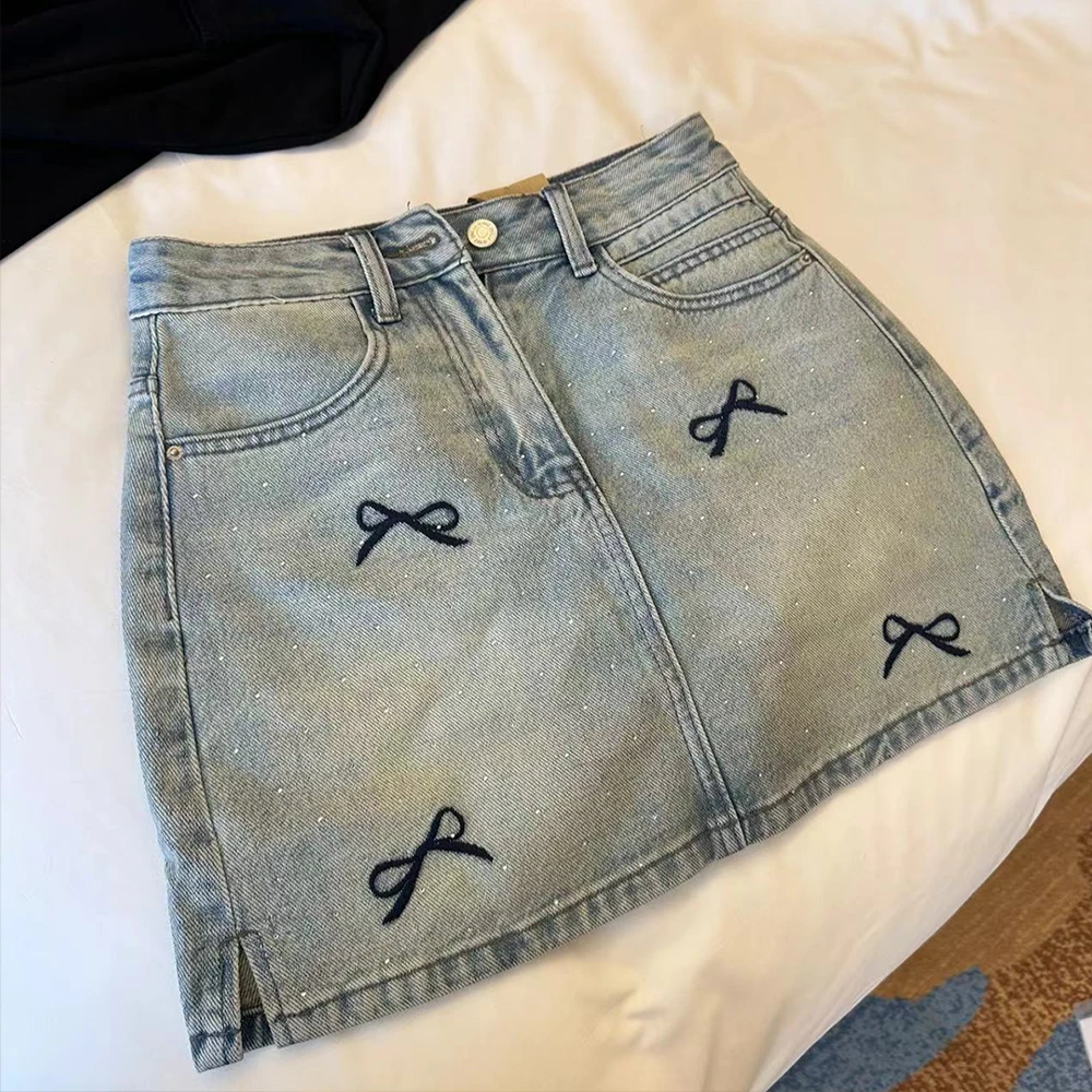 牛仔短裙女夏季2025新款高腰显瘦设计感小众蝴蝶结刺绣包臀半身裙