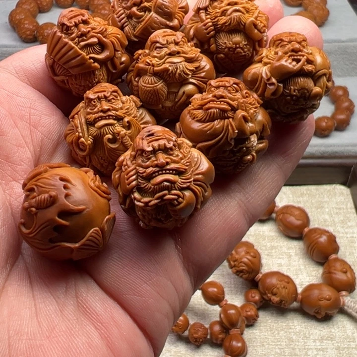 小***强手串橄榄核橄榄核雕工艺制作