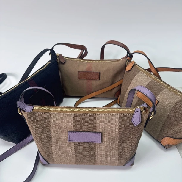 新款黄麻料配牛皮百搭手提斜背单肩小饺子包