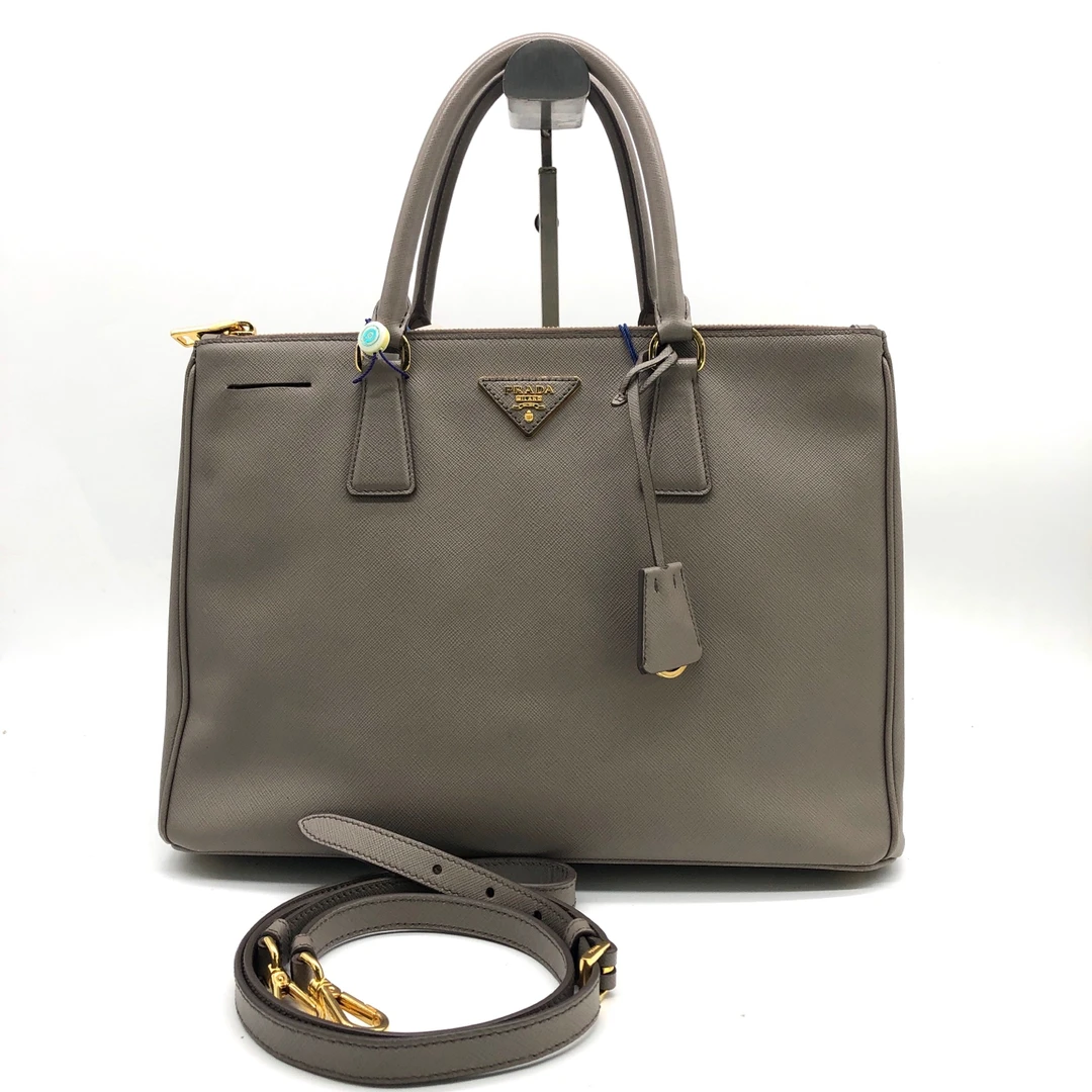 95新 Prada/普拉达    Prada/普拉达 十字纹牛皮杀手包