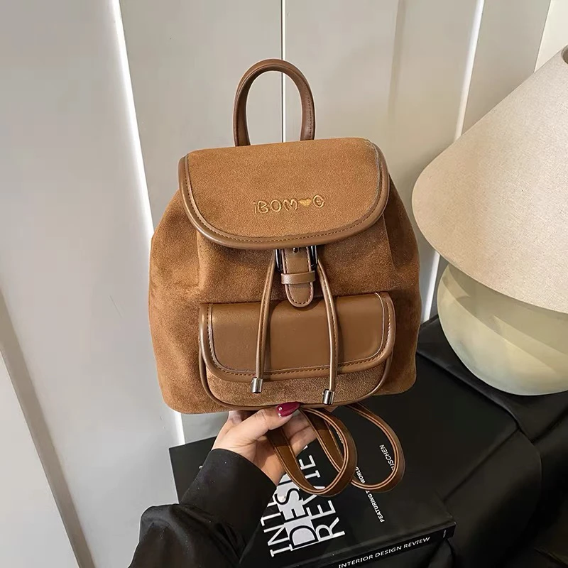 新疆包邮洋洋女包翻盖韩系通勤双肩包【181130】