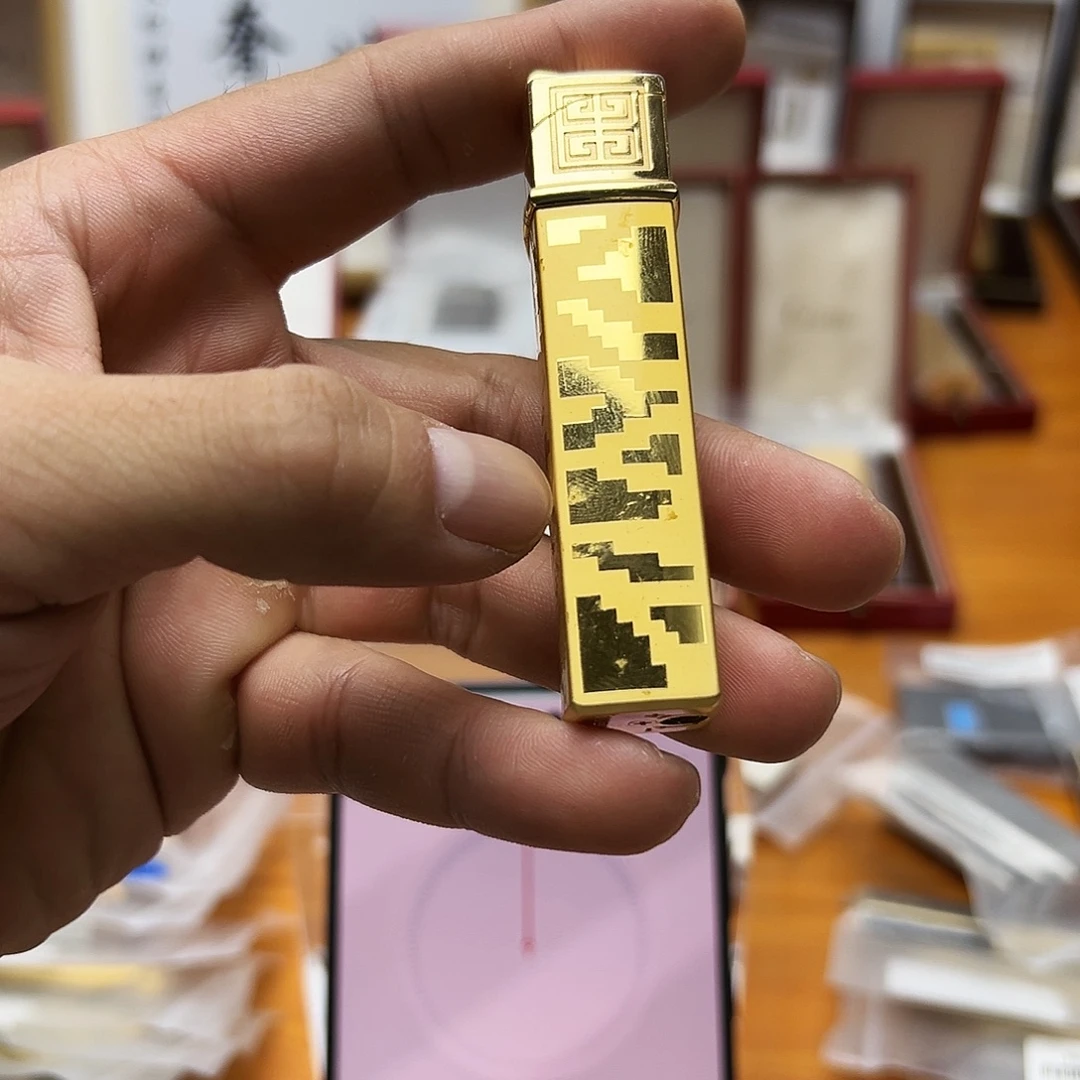 纪家金色电锤机。