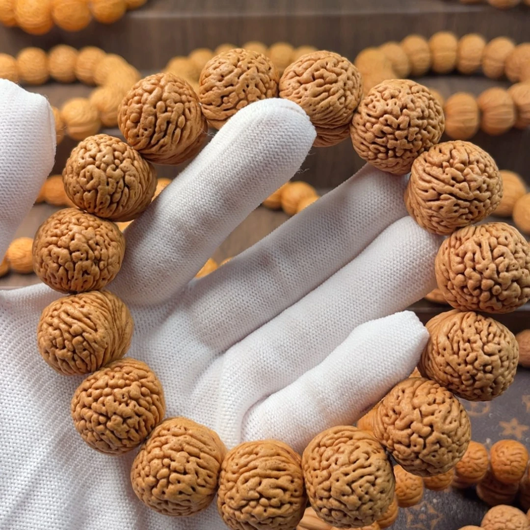 桃核吊坠龙鳞凤尾