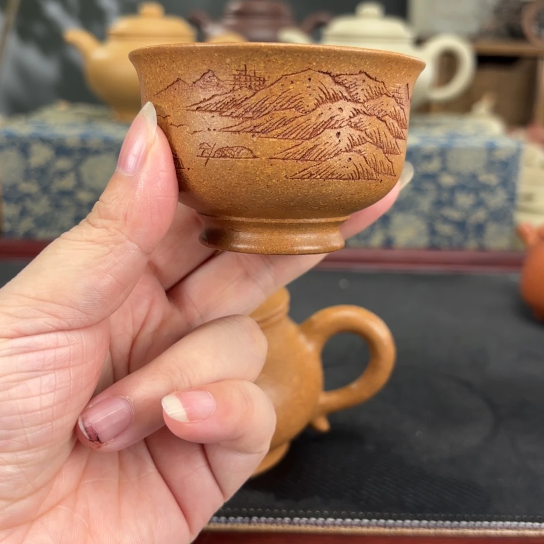 紫砂茶壶梨皮黄段刻绘主人杯