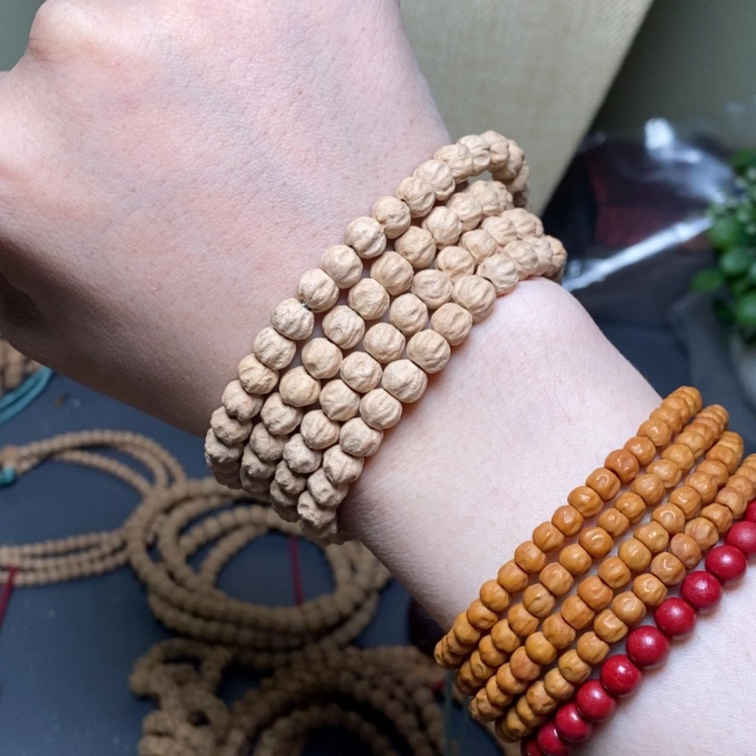 柏香籽/百香籽吊坠6.5粉皮金豆