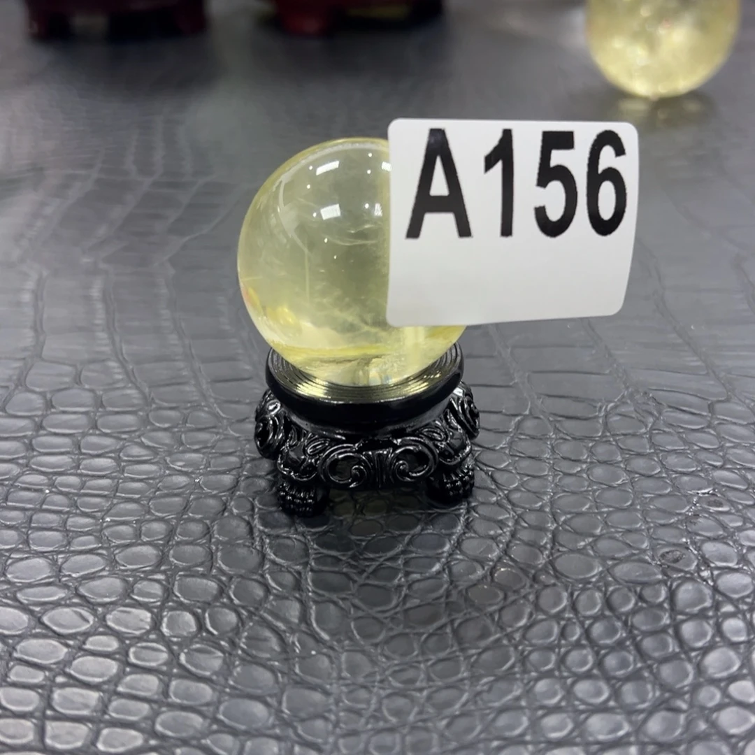 张****石材天然黄水晶球3.97