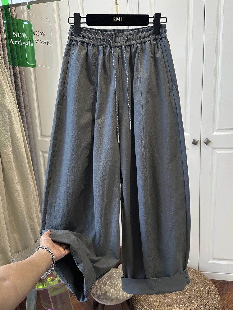 欧洲站灰绿色松紧腰抽绳休闲裤女弯刀裤宽松舒适褶皱气球裤夏薄款