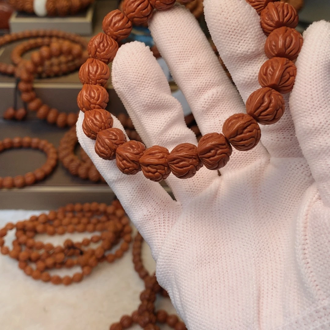 平***静手串桃核秦岭龙纹