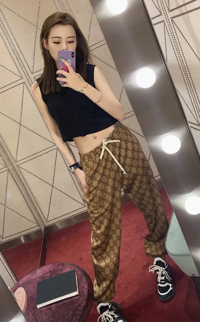 95新 GUCCI/古驰 qq573 聚酯纤维/棉 老花满印休闲裤 xs码