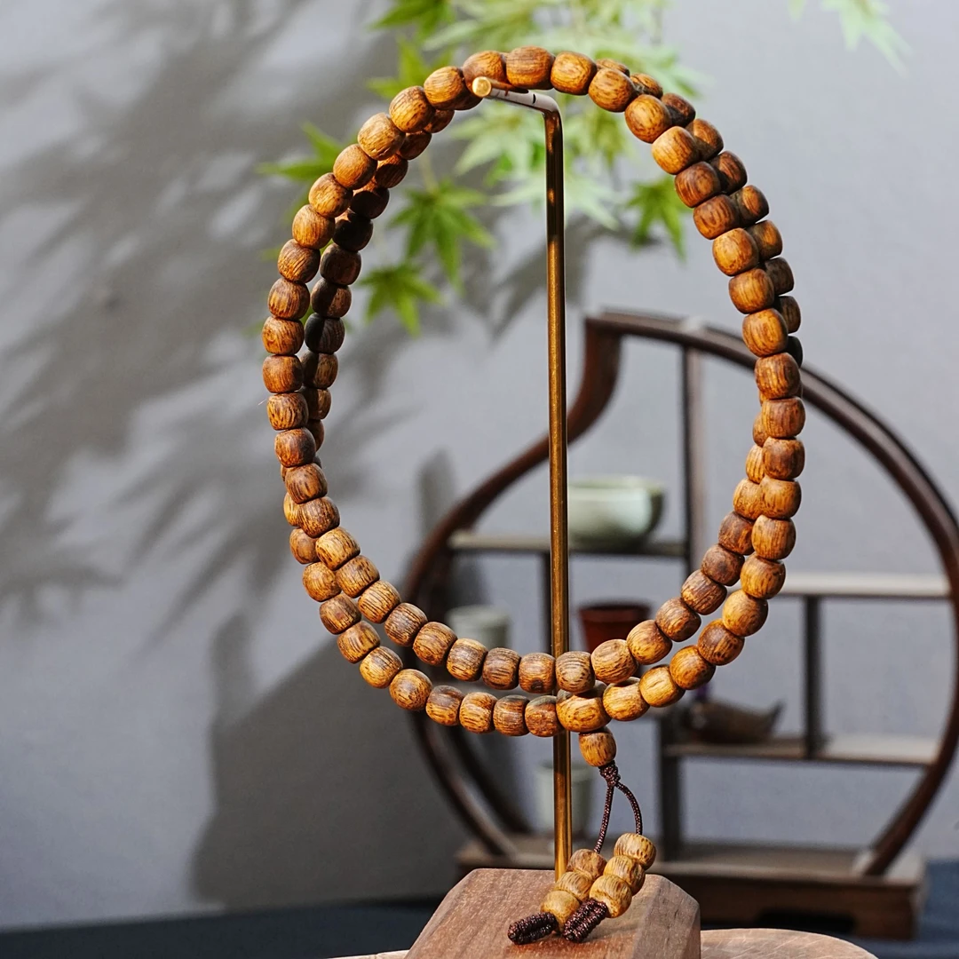 "香港黄奇楠沉香老型珠  0.65x0.6cm  12.53g 250711062 C"