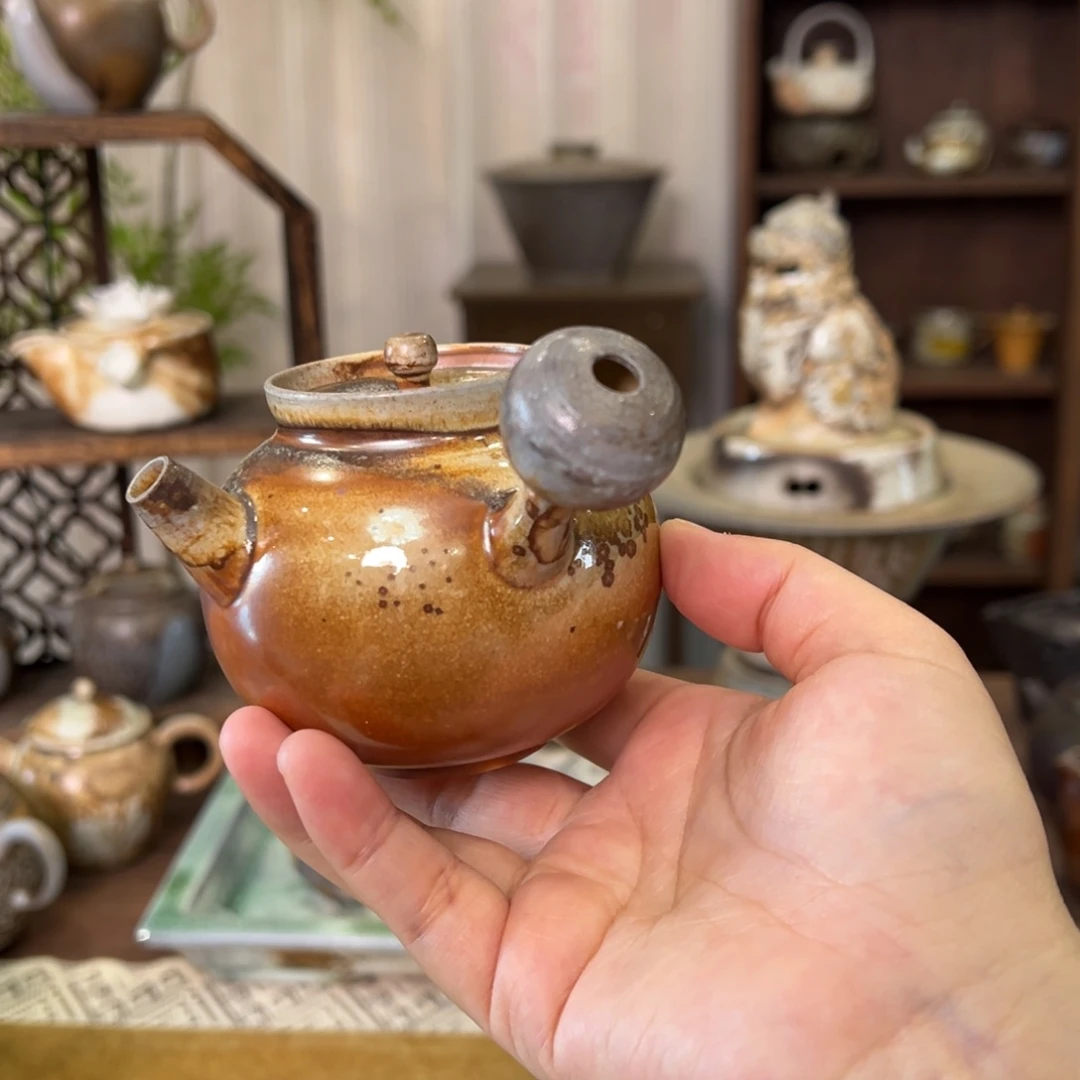 10中白重落灰侧把壶